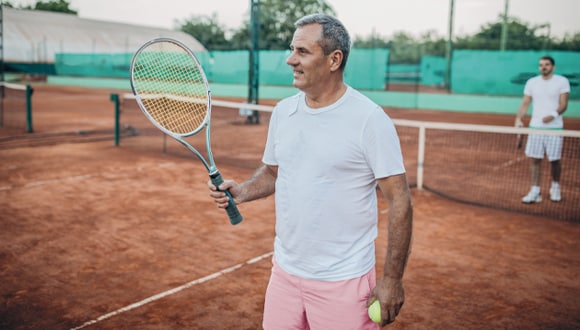 Tendonitis can be caused by repeated movements over time: A man playing tennis