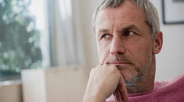 Man sitting down learning how to manage his anger