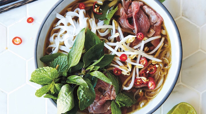 A low-kilojoule beef pho recipe served with fresh chilli