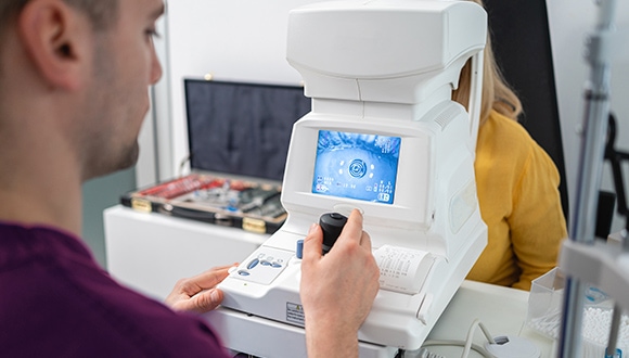An optometrist doing an eye test