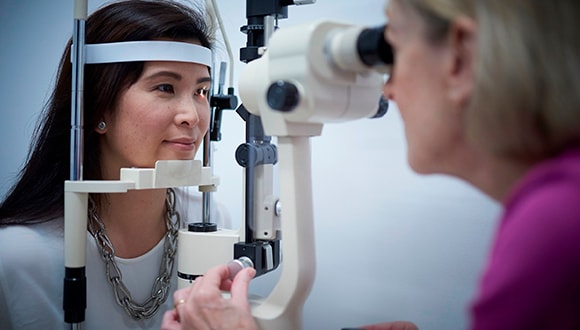 Woman at an optometrist having an eye test