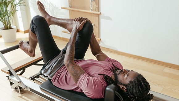 Man doing exercises and stretches for better health