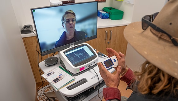 Woman getting a telehealth medical consultation via her computer