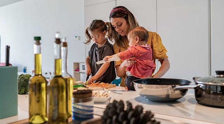 Mum and kids cooking together: reducing the mental load in caring for your family