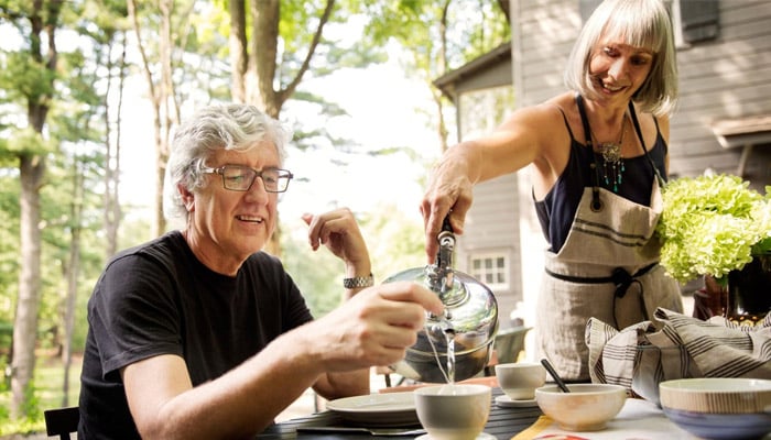 man with wife in backyard