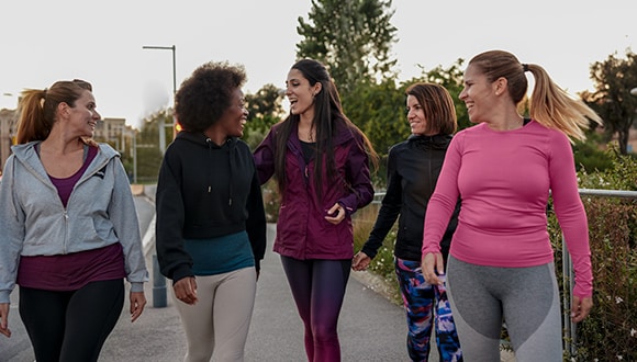 5 women walking together