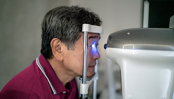 Man with diabetes getting an eye test
