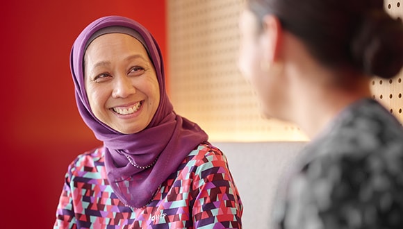 An HCF employee helping a member keep their private health insurance cover