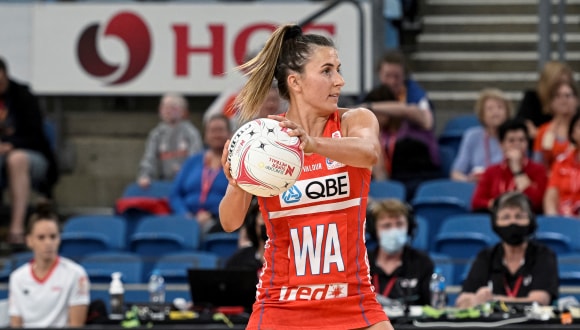 Super Netball player Maddy Proud on court.