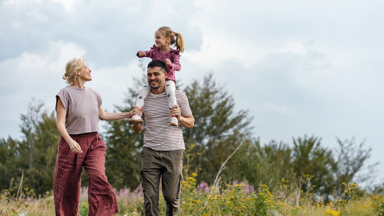 father-carrying-child-on-shoulders.jpg