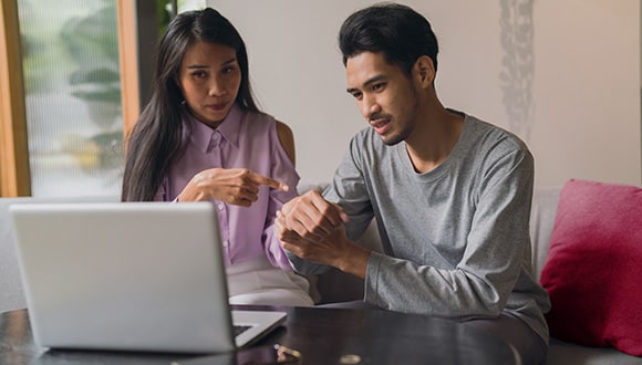 couple talking to medical professional over telehealth