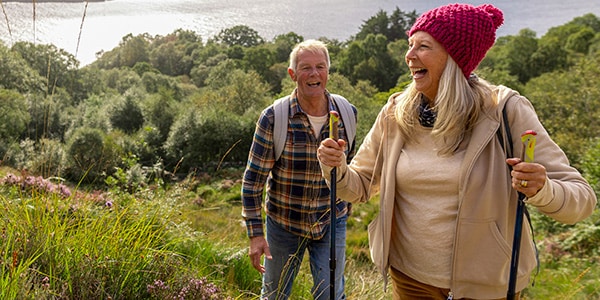 A couple over 50 going hiking for good health