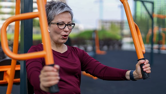 Woman over 50 doing arm exercises