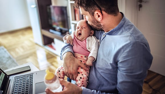Man holding a baby
