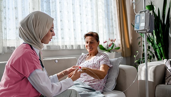 Woman getting nursing care in her home