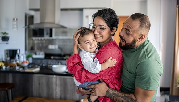 Mother and father with their toddler child