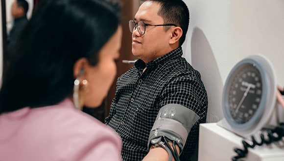 Man getting his blood pressure checked