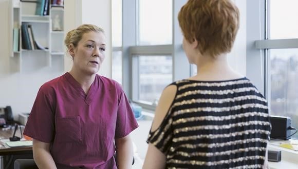 Woman learning about endometriosis facts and myths
